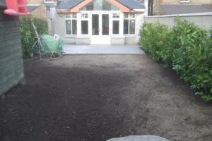 During from project Granite Patio and Natural Grass Lawn